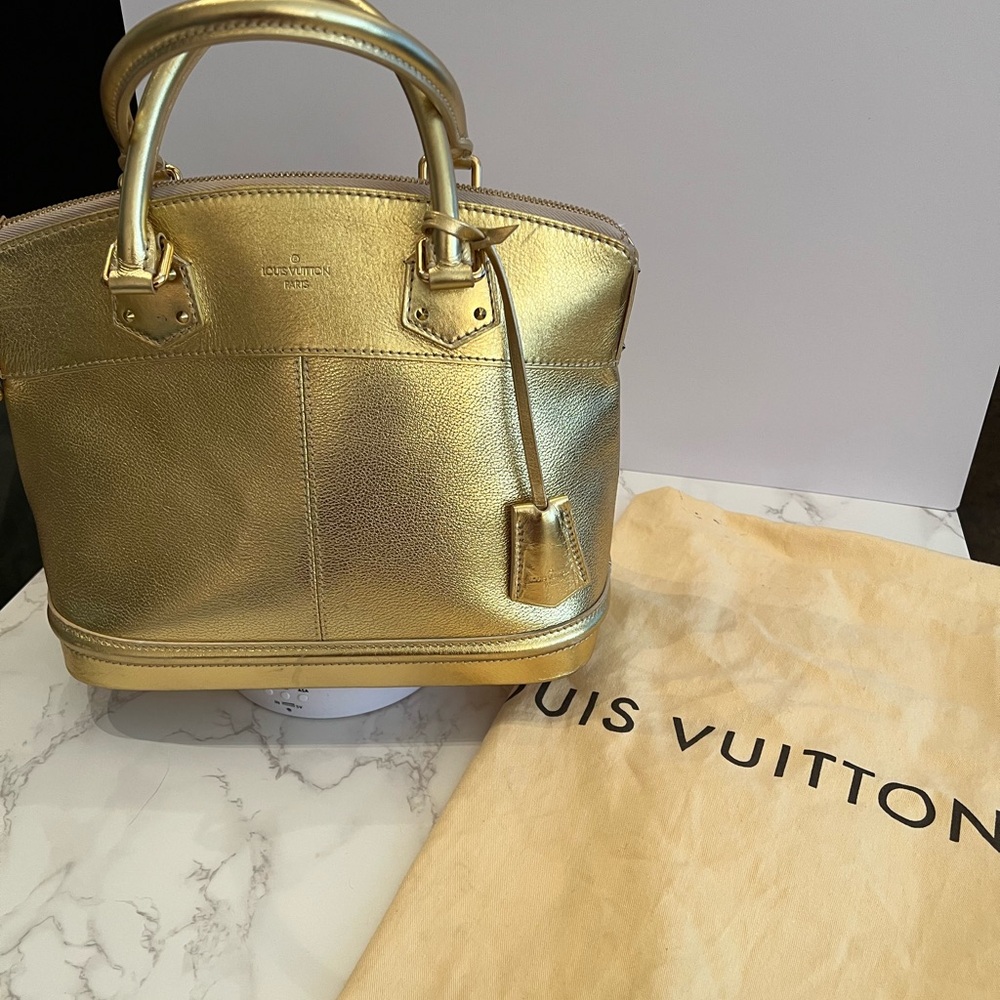 LOUIS VUITTON Suhali Lockit PM in Gold